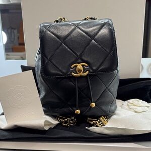 CHANEL Black Quilted Leather Drawstring Backpack with Gold CC Hardware